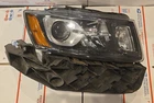2014-2016 Grand Jeep Cherokee Limited Passenger (r) Halogen Headlamp (oem) Used. Price: $79.99.