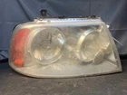 Fits 2003-2006 Lincoln Navigator Right Headlight Assembly OEM:6L7Z13008BA Used. Price: $190.53.