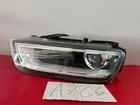 2015-2019 Audi Q3 Left Driver Hod Xenon Self Adjusting Headlight Headlamp OEM786 Used. Price: $751.00.