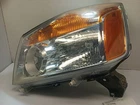 Driver Left Headlight From 2009 Nissan Titan 11338615 Used. Price: $130.94.