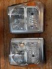 Ford Genuine Oem Pair RH1 & LF1 Headlamp Assembly Part# ASY-BC34-13006-A Pre Used. Price: $160.00.