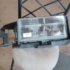 1994 1995 1996 Fleetwood Brougham Headlight & Bracket Right Oem Used Cadillac. Price: $100.00.