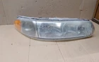 2002-2005 Buick Century Passenger Side Headlight Missing One Bulb Used. Price: $66.00.