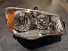 Dodge Grand Caravan / Chrysler Town & Country Right Headlight 05113336AG Oem Used. Price: $55.00.