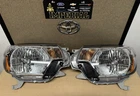 2012-2015 Toyota Tacoma New Left & Right Headlamps Headlights Genuine Oem. Price: $750.00.