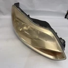 2012-2014 Ford Focus Right Headlight Assembly Oem BM5113W029F Used. Price: $100.00.