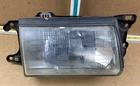 1987 1989 Mercury Tracer Right Passenger Side Headlight Assembly 114-00124 Oem Used. Price: $59.99.
