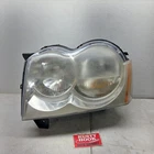200 Jeep Grand Cherokee Driver Left Head Light Part# 30987 Used. Price: $60.00.