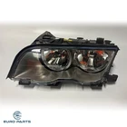 Headlight Assembly Set Left Driver Side Fits 1999-2000 Bmw 114-58699 Used. Price: $150.30.