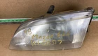 1998-1999 Mazda 626 Front Left Driver Side Headlight Assembly. Used. Price: $62.99.