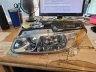Driver Left Headlight Fits 98-00 Town & Country 1684078 New. Price: $88.05.