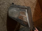 2012 Ford Mustang Driver Side Headlight Assembly With Bulb Used. Price: $25.00.