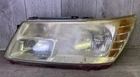# 2009-2010-2011-2012-2013 Dodge Journey Lh Driver Side Headlight Oem Used. Price: $64.99.