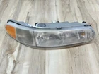 2002-2005 Buick Century, 97-04 Regal Oem Right Passenger Headlight Assembly Used. Price: $56.21.