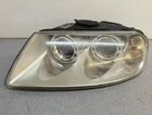 2004-2007 Volkswagen Touareg Left Lh Driver Side Headlight Xenon Oem Used. Price: $202.45.