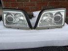 96-02 Mercedes R129 SL320 SL500 Right & Left Side Headlight Lamp Xenon Oem Used. Price: $1800.00.
