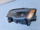 2017-2021 Jeep Grand Cherokee Hid Xenon Headlight Oem 68266655AJ Used. Price: $180.00.
