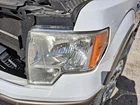 2009-14 Driver Headlight Halogen Bright Border Trim Ford F150 3704427 Lamp Oem Used. Price: $104.70.