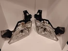 97-05 Venture Silhouette Montana Transport Left & Right Headlight Headlamp New. Price: $85.00.