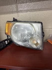 2008-2012 Ford Escape Right Headlamp Light Assembly Oem 9L84-13005-A Used. Price: $30.00.