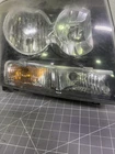 2007-2014 Chevy Avalanche Tahoe Right Headlight Oem# 6002TA0054 Damaged Tabs Used. Price: $50.00.