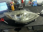 Passenger Headlight Halogen With Black Trim Fits 08-10 Mazda 5 2069763 Used. Price: $134.80.