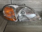 Passenger Right Headlight Assembly Fits 1996 1997 1998 Honda Civic Used. Price: $27.00.
